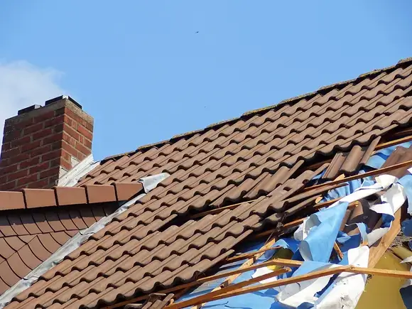 Storm damaged tiled roof